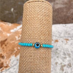 Evil Eye Gold and Blue Beaded Bracelet